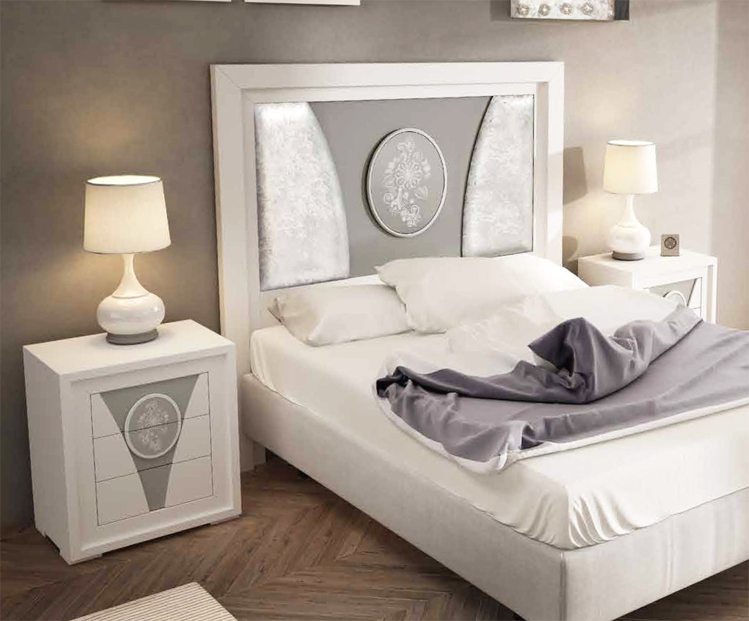 DORMITORIO CABECERO TAPIZADO Y PANEL CON DETALLE OVALADO