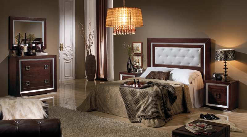 Dormitorio con cabecero tapizado